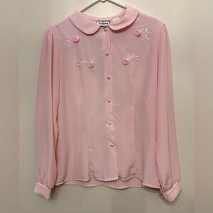 Charlotte Vanhorne: Women's medium light pink blouse, with embroidered roses.